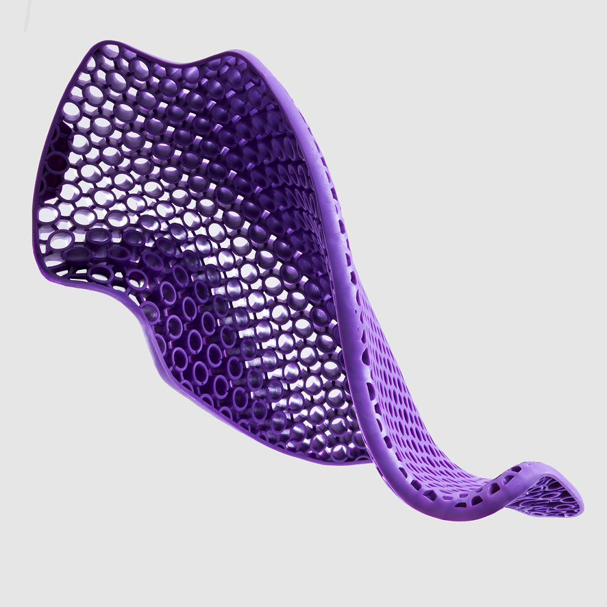 Purple seat cushion with a unique honeycomb design on a light gray background